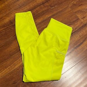 Bright Yellow colored Fabletics work out pants. Size XS.